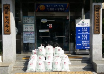마리면, 익명의 기부자 10년간 백미 기탁