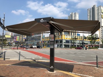 세종시, 자동 개폐 기능 스마트 그늘막서 더위 피해요!